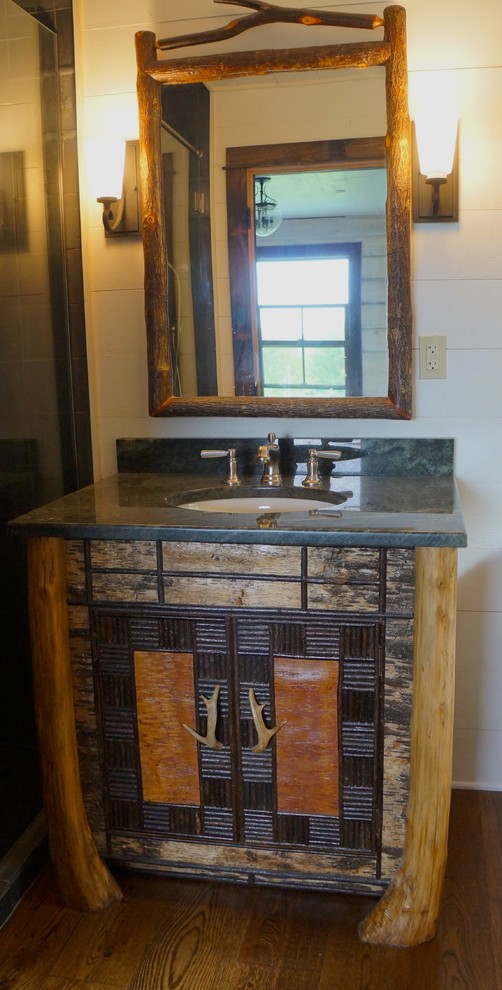 Mountain style home design photo in Burlington