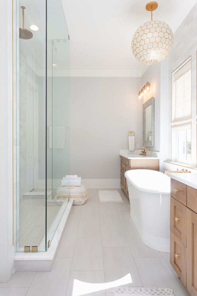 This is an example of a medium sized nautical ensuite bathroom in Charleston with freestanding cabinets, white cabinets, a corner shower, a two-piece toilet, glass tiles, white walls, mosaic tile flooring, an integrated sink, white floors, a hinged door, white worktops, a shower bench, a single sink and a freestanding vanity unit.