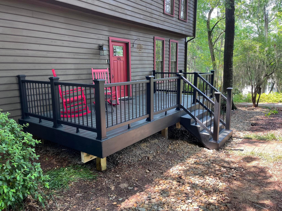 Inspiration for a small craftsman courtyard ground level mixed material railing deck remodel in Charlotte with a bbq area and no cover