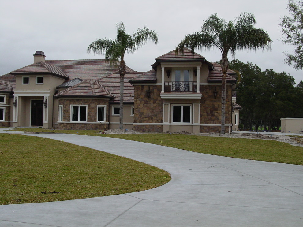 Beige two-story exterior home photo in Orlando