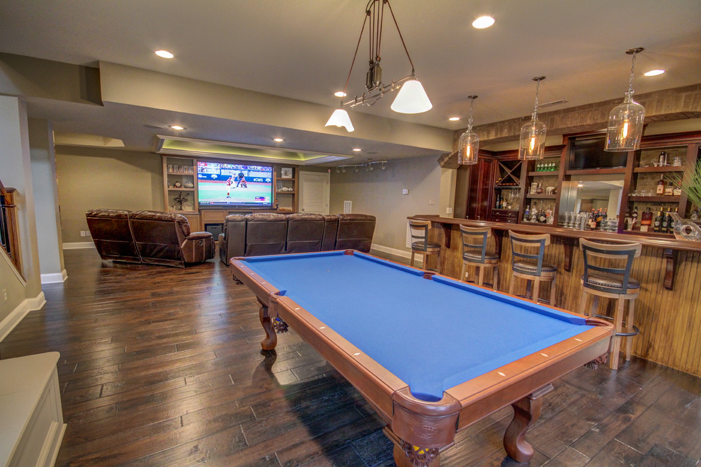 Example of a large transitional look-out ceramic tile basement design in Richmond with beige walls