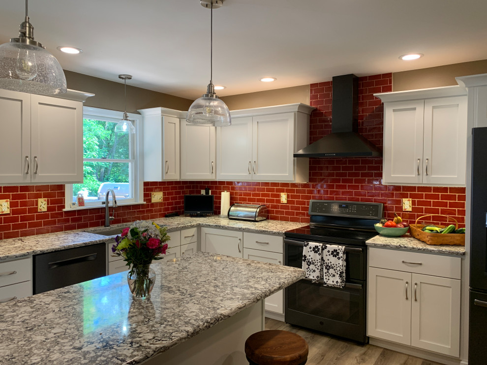 Inspiration for a transitional kitchen remodel with red backsplash
