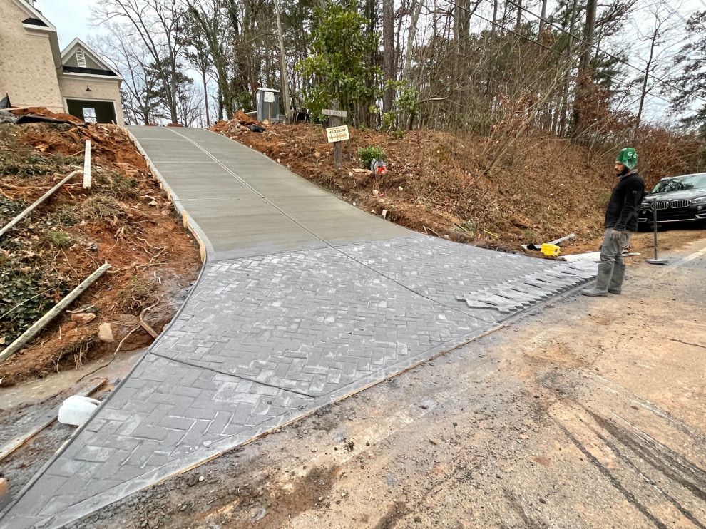How long before walking or driving on a new concrete driveway?