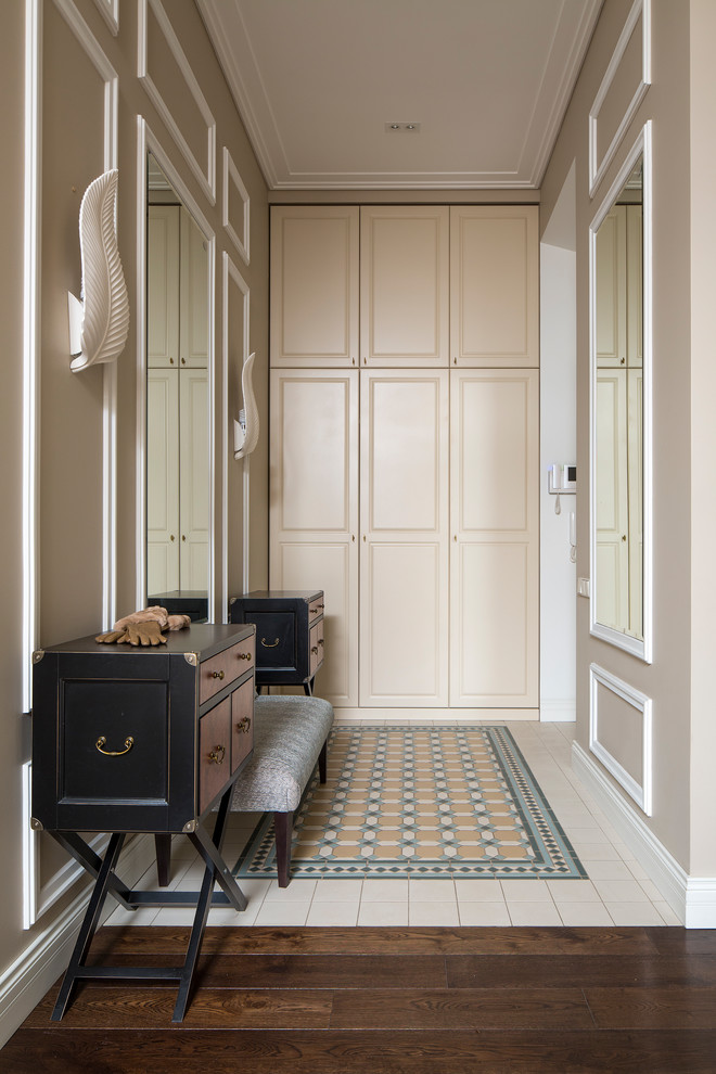 Photo of a transitional mudroom in Moscow with beige walls.