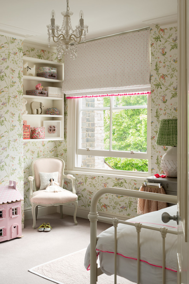 Design ideas for a traditional kids' room for kids 4-10 years old and girls in London with carpet and grey floor.