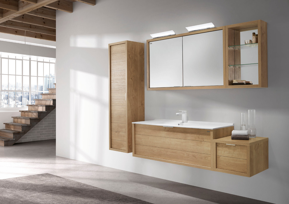 Inspiration for a mid-sized modern 3/4 bathroom in Miami with flat-panel cabinets, light wood cabinets, grey walls, concrete floors, an integrated sink and engineered quartz benchtops.