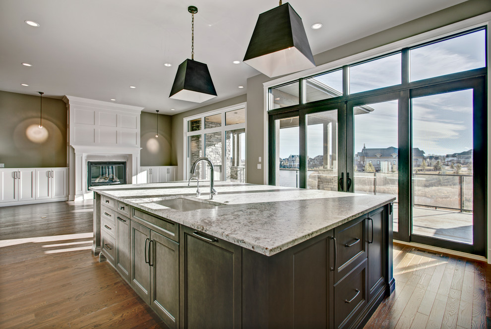 Example of a transitional kitchen design in Calgary