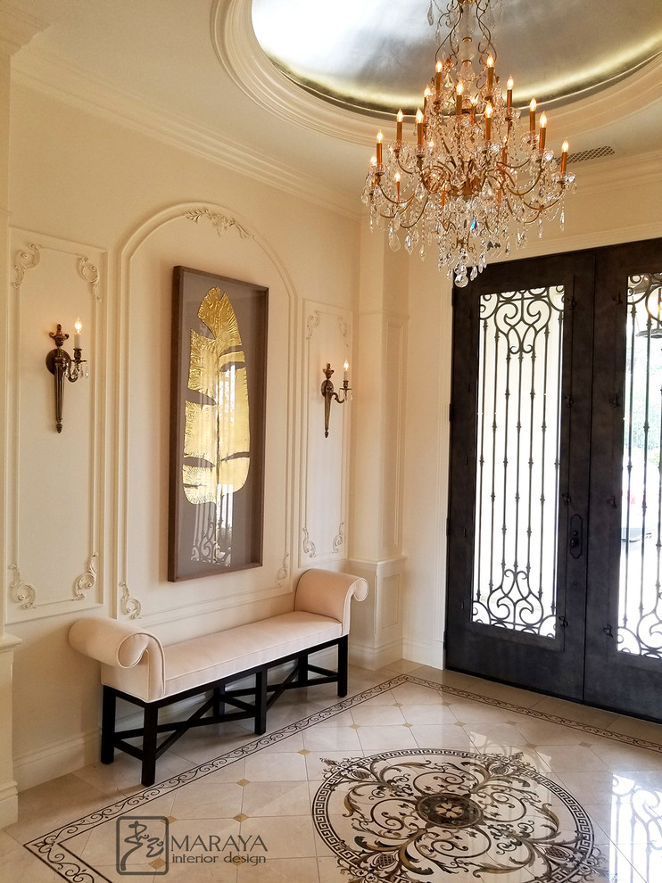 Photo of a mid-sized traditional front door in Los Angeles with white walls, marble floors, a double front door, a black front door and beige floor.
