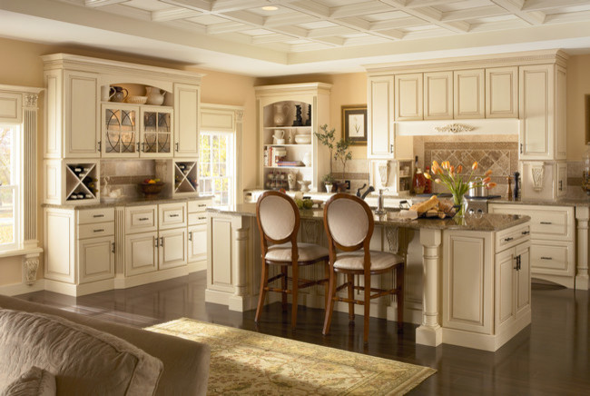 Inspiration for a large traditional eat-in kitchen in Other with raised-panel cabinets and with island.