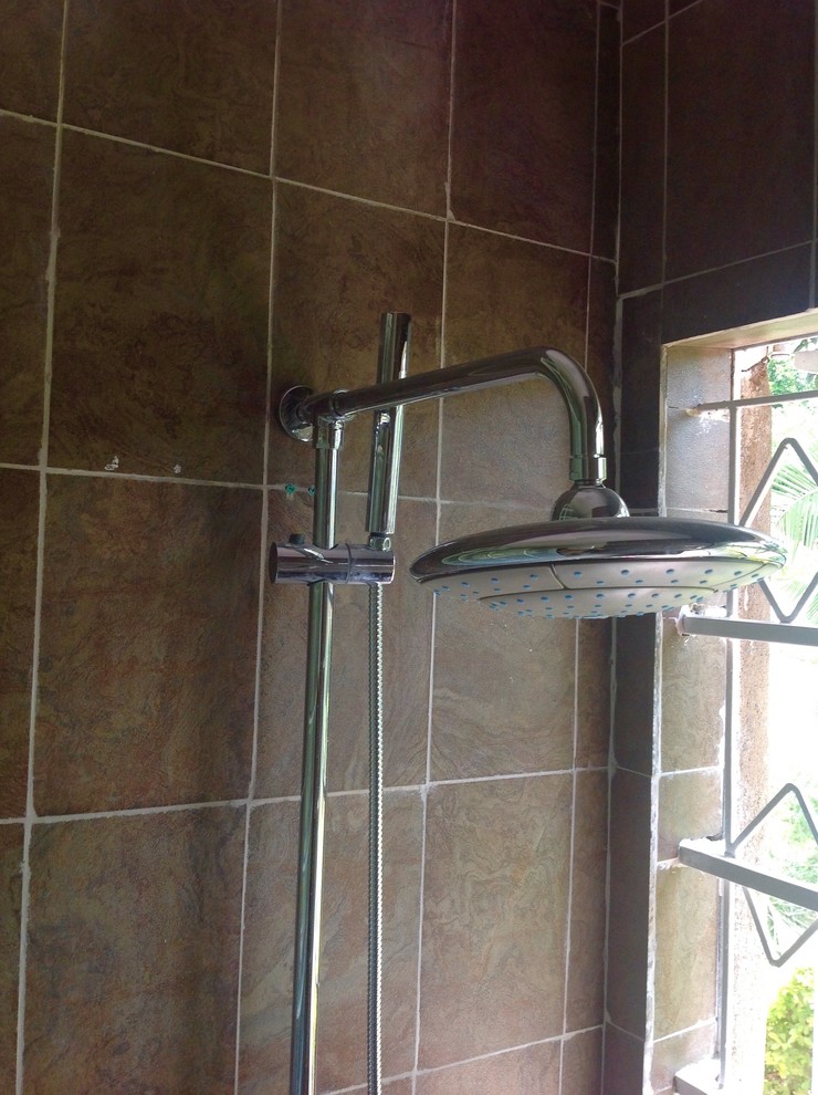 Bathroom - rustic gray tile bathroom idea