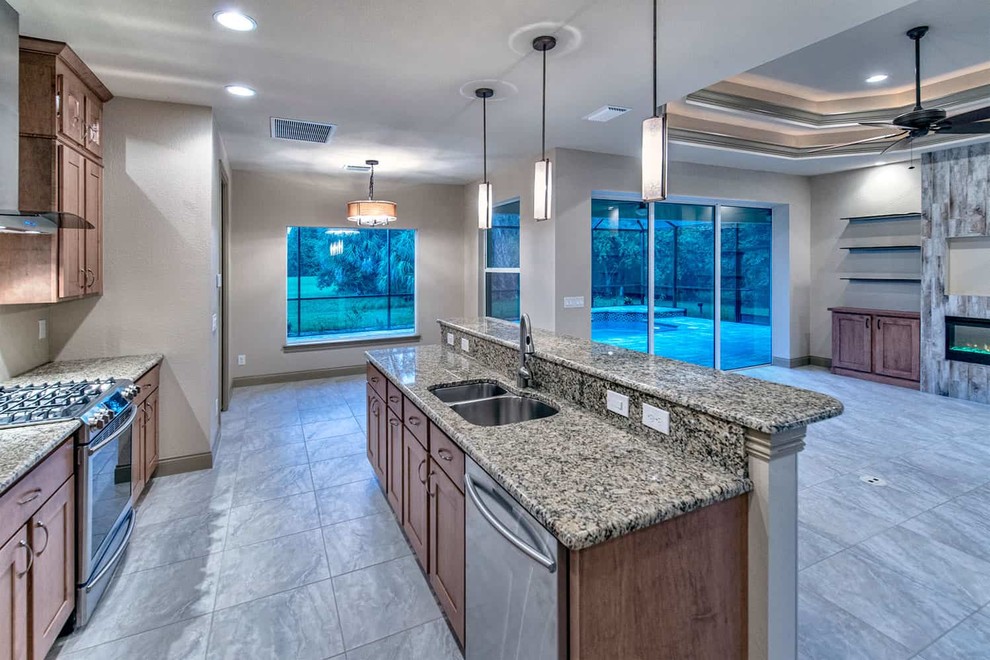 Example of a transitional home design design in Miami