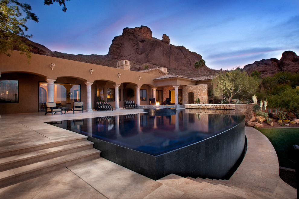 Design ideas for a contemporary infinity pool in Phoenix.