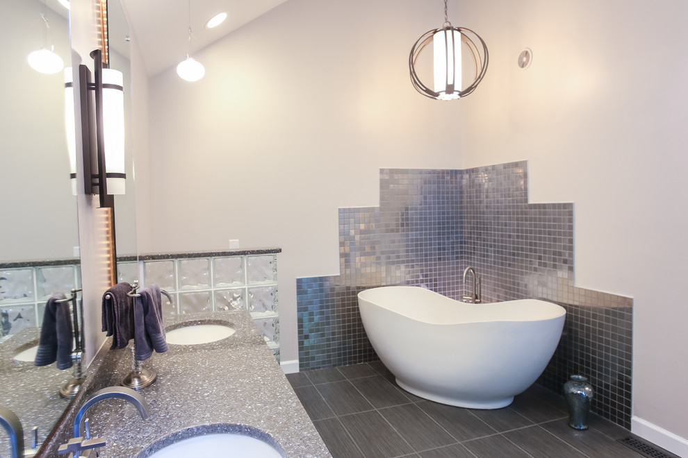 This is an example of a large contemporary master bathroom in Atlanta with a freestanding tub, a corner shower, white walls, an undermount sink and an open shower.
