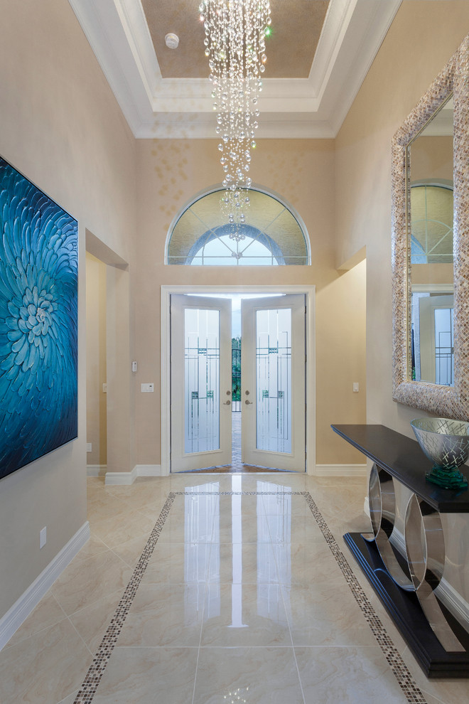 Inspiration for a contemporary entryway in Miami with yellow walls and a double front door.
