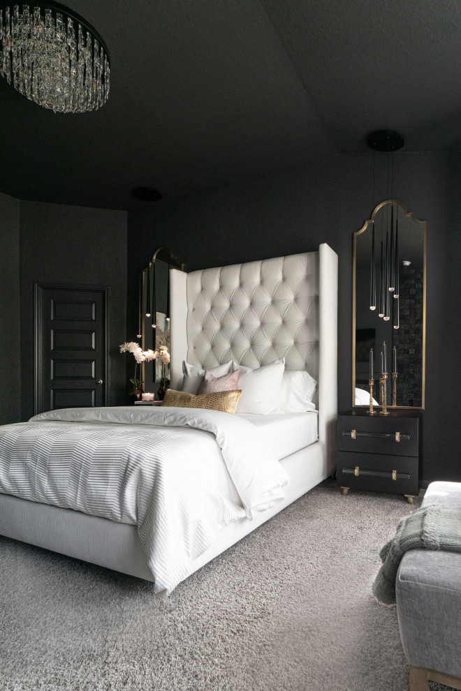 Foto di una camera matrimoniale minimal di medie dimensioni con pareti nere, moquette, camino classico, pavimento beige e pannellatura