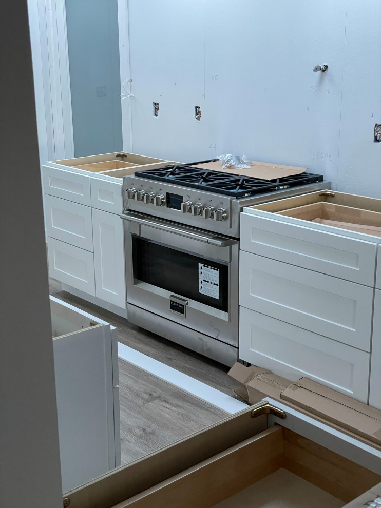 Example of a minimalist kitchen design in Seattle