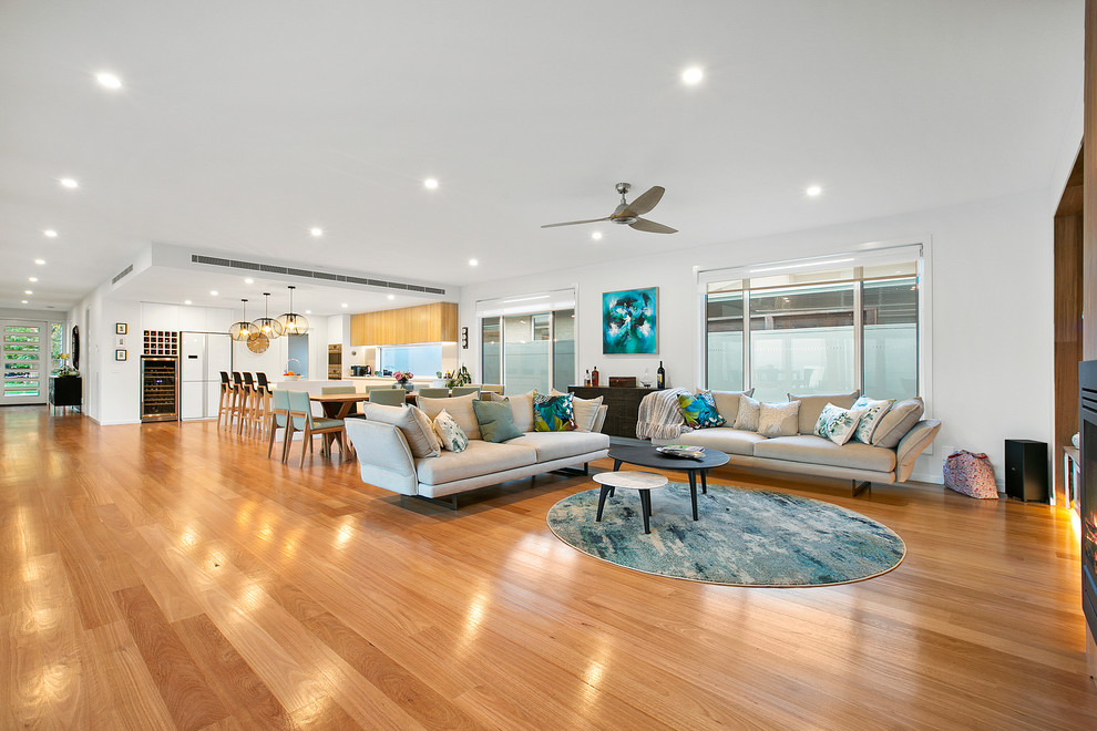 Design ideas for a beach style living room in Melbourne.