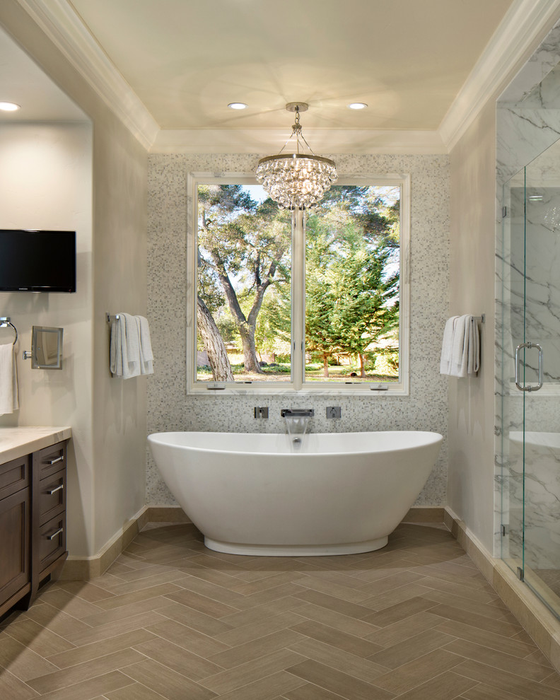 Inspiration for a transitional bathroom in San Francisco with a freestanding tub, an alcove shower, recessed-panel cabinets, dark wood cabinets and white tile.