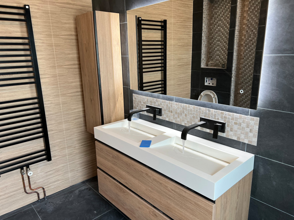 Inspiration for a mid-sized contemporary master bathroom in Paris with beaded inset cabinets, brown cabinets, a curbless shower, gray tile, a wall-mount sink, wood benchtops, grey floor, an open shower, white benchtops, a double vanity, a floating vanity, coffered and wood walls.