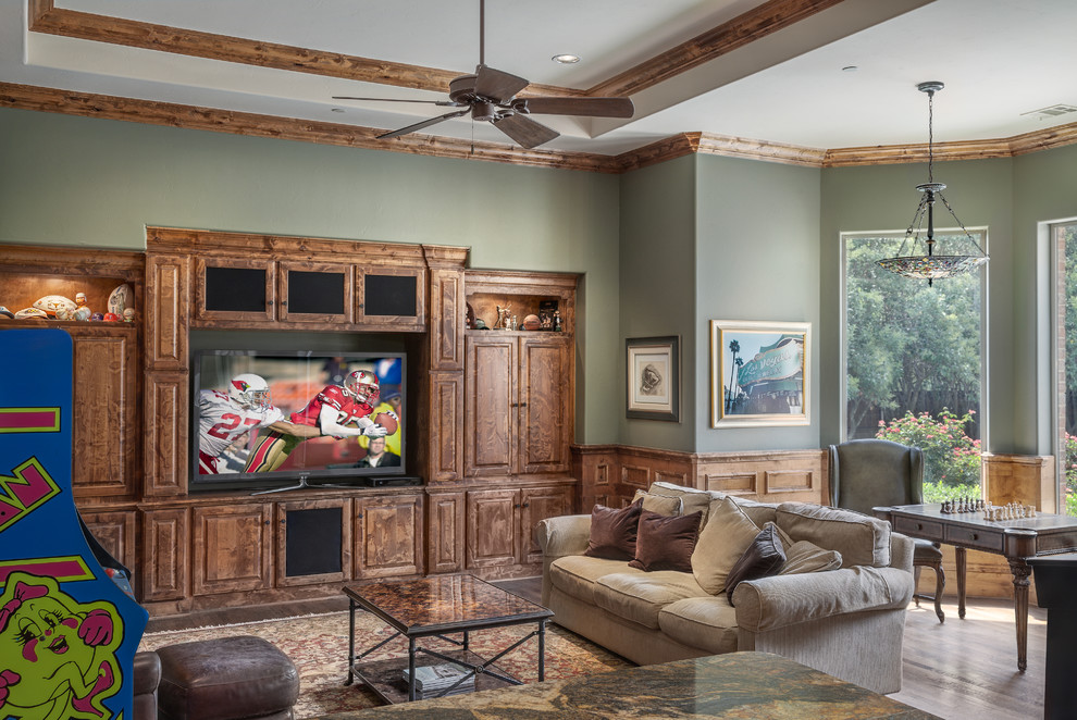Photo of a large traditional open concept living room in Dallas with white walls, dark hardwood floors, a corner fireplace, a stone fireplace surround and a built-in media wall.