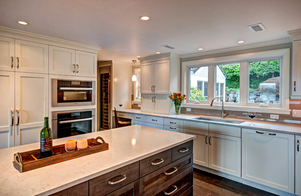 Example of a transitional kitchen design in Seattle