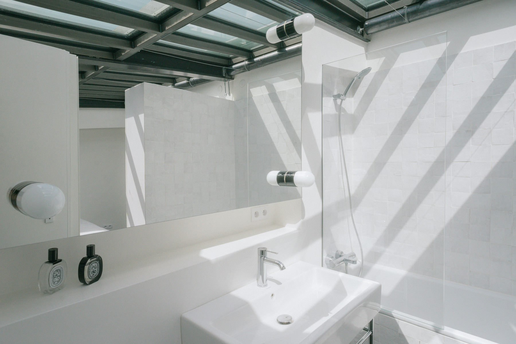 Réhabilitation d'un duplex esprit loft avec toit verrière coulissant