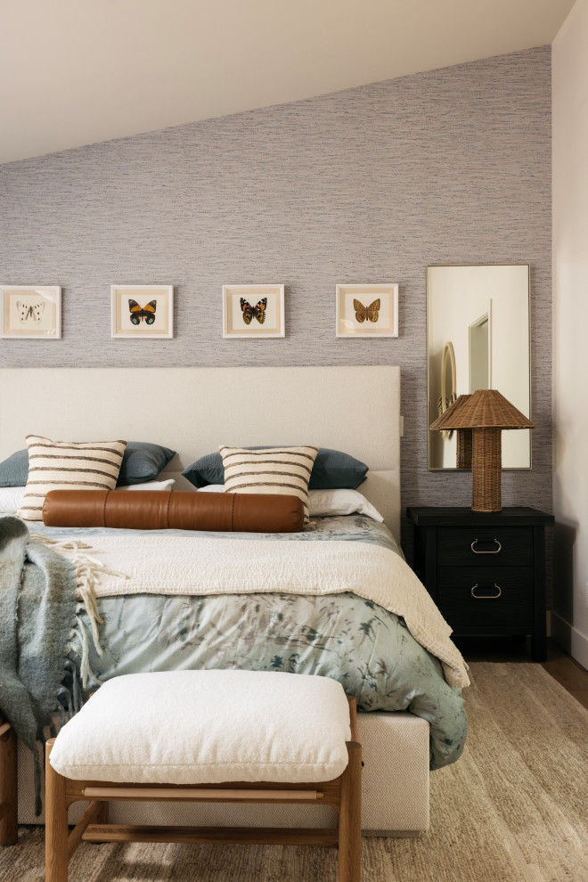 Inspiration for a large transitional medium tone wood floor, brown floor, exposed beam and wallpaper bedroom remodel in Phoenix with gray walls