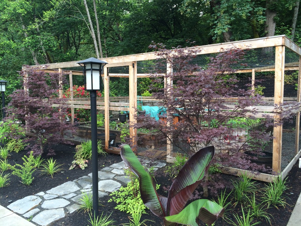 This is an example of a large contemporary backyard garden in Portland with a vegetable garden.
