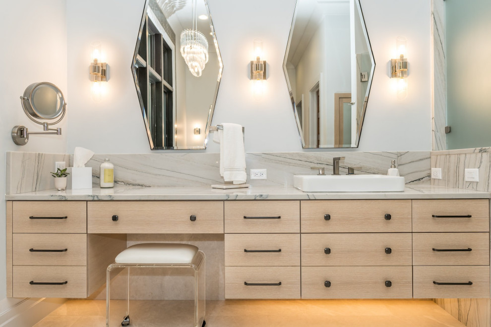 Large transitional master double-sink bathroom photo in Orlando with flat-panel cabinets, light wood cabinets and a floating vanity