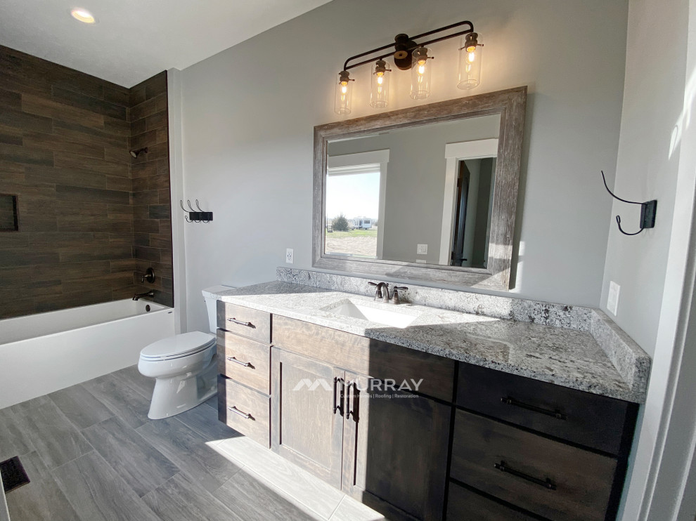 Inspiration for a rustic bathroom remodel in Omaha