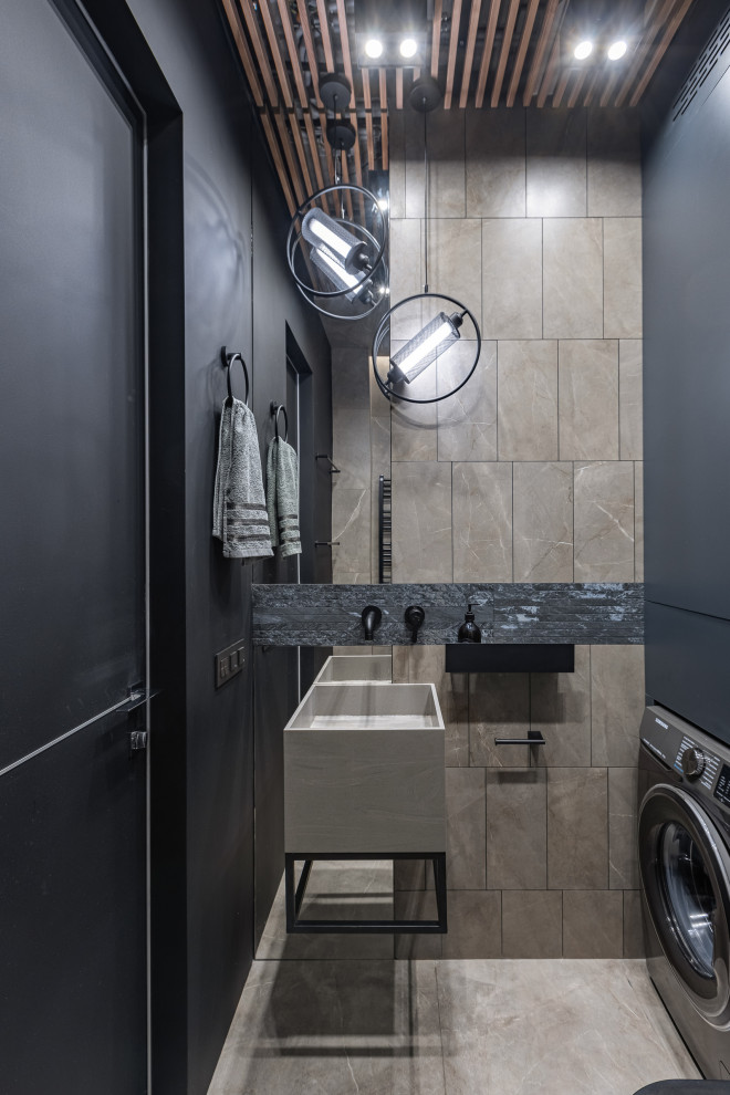 Urban bathroom in Moscow with beige tiles, black walls, a wall-mounted sink, beige floors, a laundry area, a single sink and a wood ceiling.