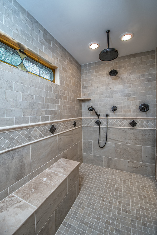 Mid-sized traditional master bathroom in Other with granite benchtops, raised-panel cabinets, light wood cabinets, a double shower, a two-piece toilet, beige tile, porcelain tile, beige walls, porcelain floors and an undermount sink.