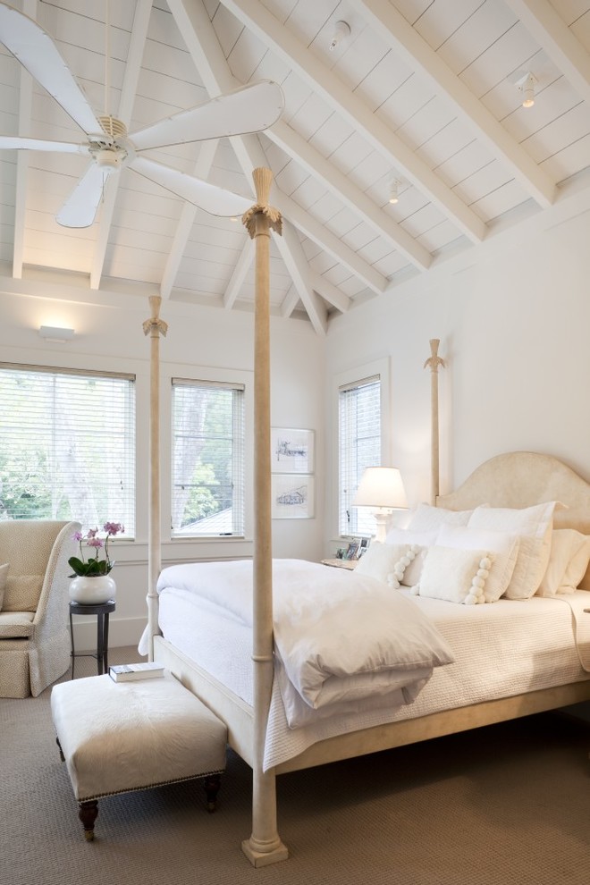 Photo of a transitional bedroom in San Francisco with white walls.