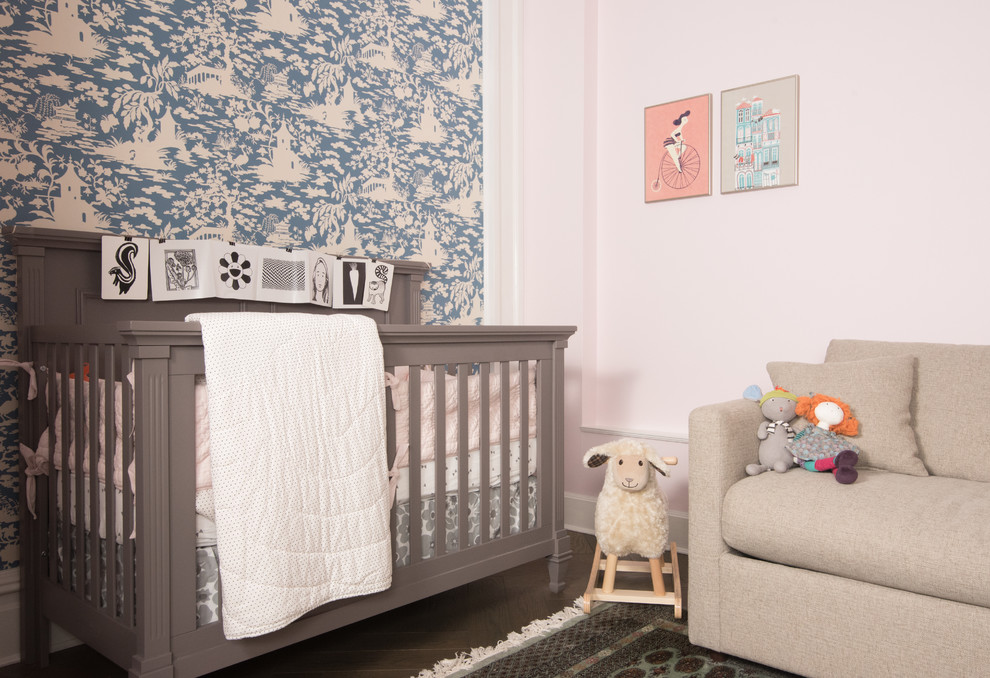 Small asian gender-neutral nursery in New York with dark hardwood floors.