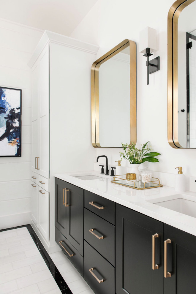 Inspiration for a mid-sized country master bathroom in Charleston with shaker cabinets, black cabinets, white walls, ceramic floors, an undermount sink, white floor, white benchtops, a double vanity, a built-in vanity and wood walls.