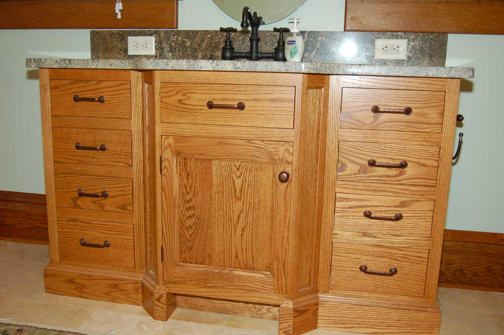 Bathroom - mid-sized transitional master slate floor bathroom idea with raised-panel cabinets, dark wood cabinets, white walls and a drop-in sink