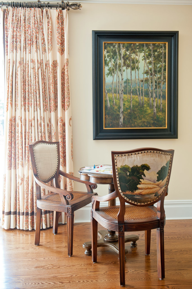 Family room - mid-sized traditional open concept light wood floor family room idea in New York with beige walls, no fireplace and no tv