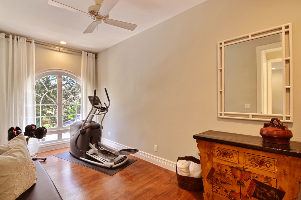 This is an example of a beach style home gym in Other.