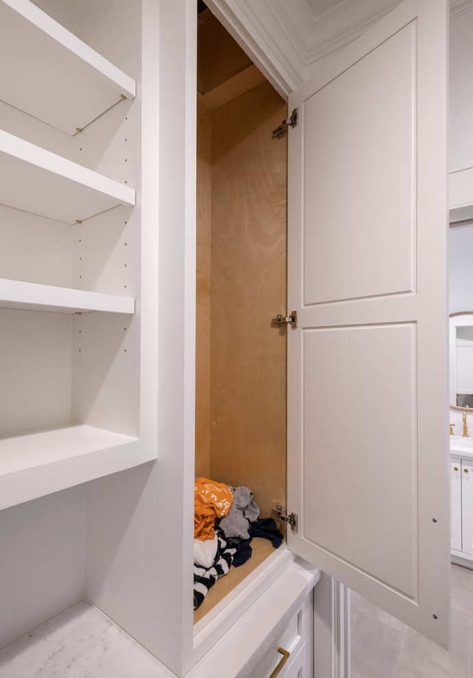 Inspiration for a transitional laundry room remodel in Houston