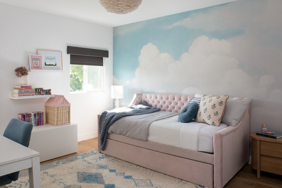 This is an example of a medium sized scandinavian kids' bedroom in Los Angeles.