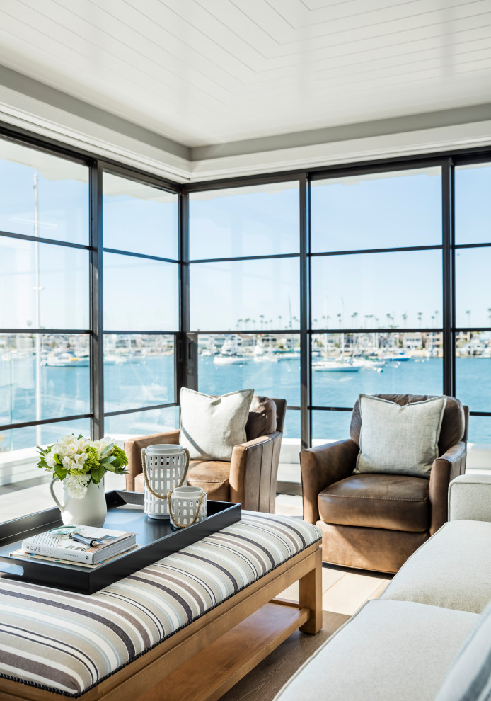 Example of a beach style home design design in Orange County