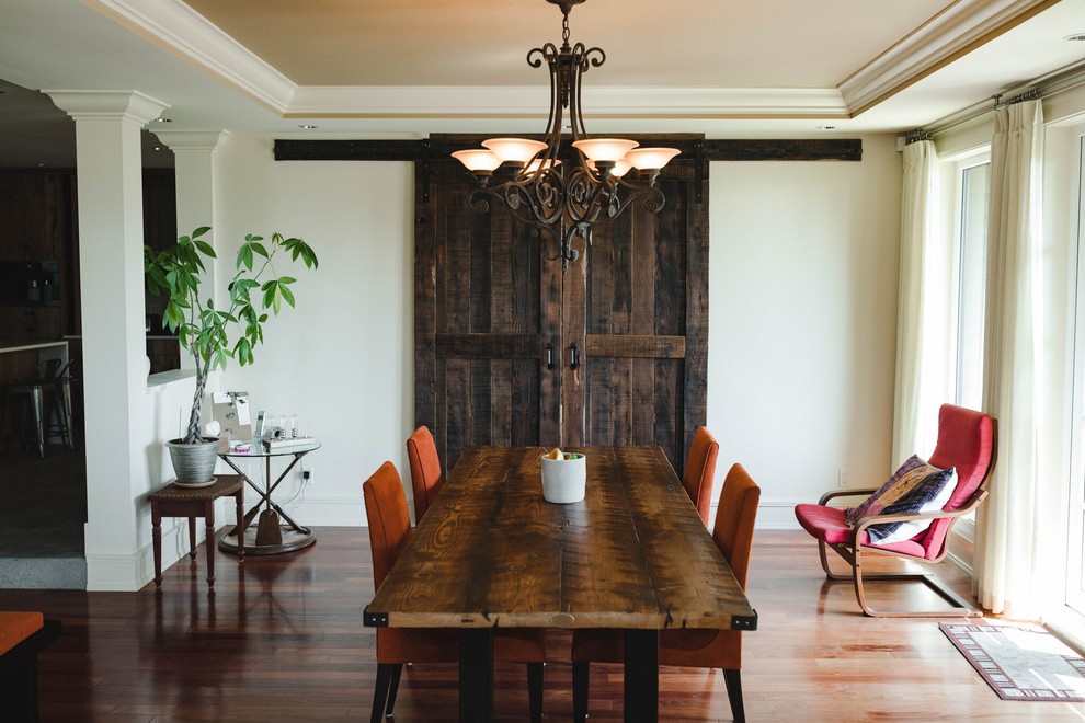 Photo of a rustic dining room in Vancouver.