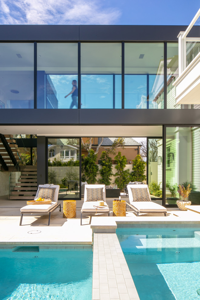 Inspiration for a transitional pool remodel in Orange County