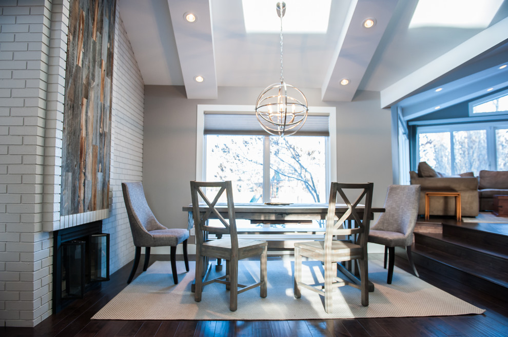 Example of a mountain style dining room design in Calgary