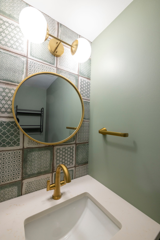 Design ideas for a small country powder room in DC Metro with green cabinets, green tile, porcelain tile, green walls, porcelain floors, engineered quartz benchtops, green floor, white benchtops, a built-in vanity, shaker cabinets and an undermount sink.