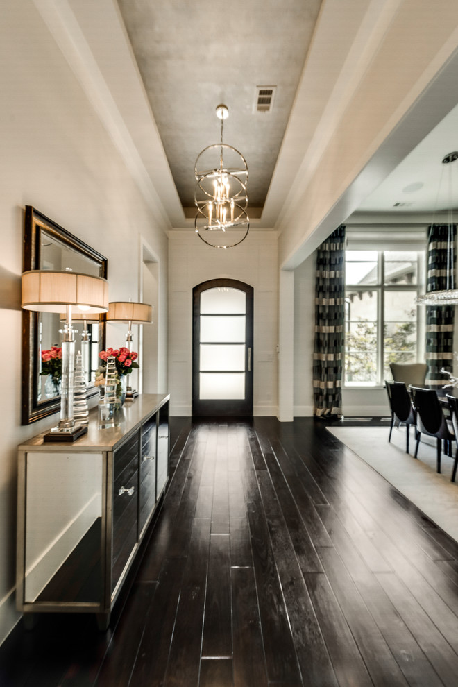 Mid-sized transitional dark wood floor front door photo in Dallas with beige walls and a metal front door