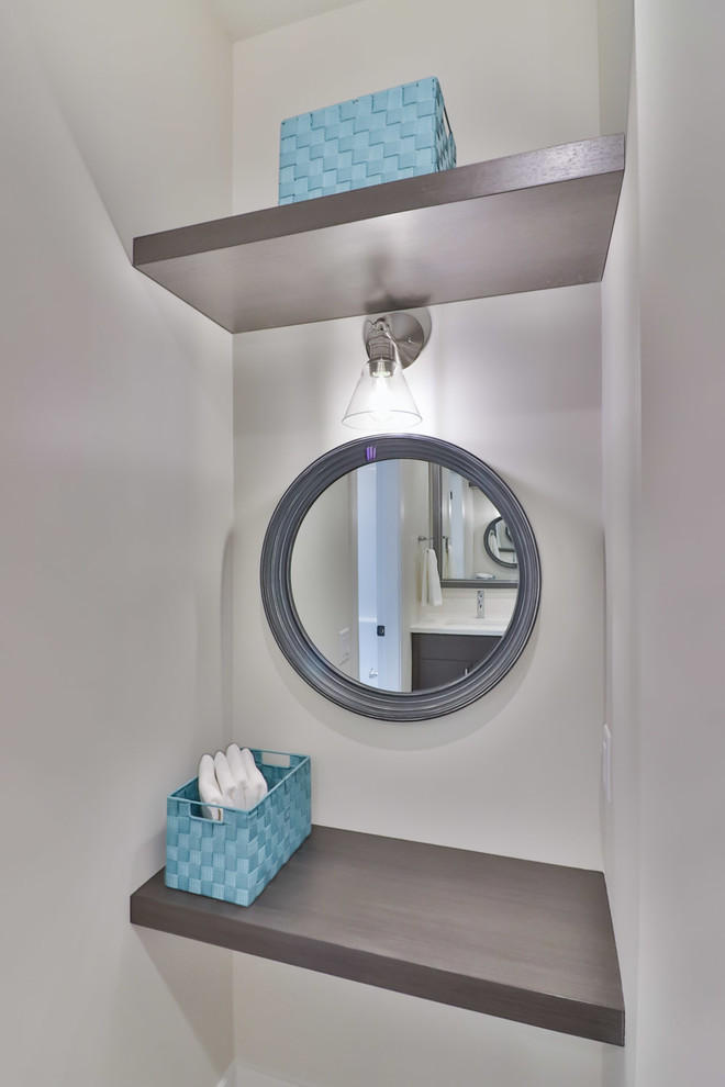 Inspiration for a large transitional kids' white tile and porcelain tile vinyl floor and gray floor alcove bathtub remodel with flat-panel cabinets, gray cabinets, a two-piece toilet, gray walls, an undermount sink and quartz countertops