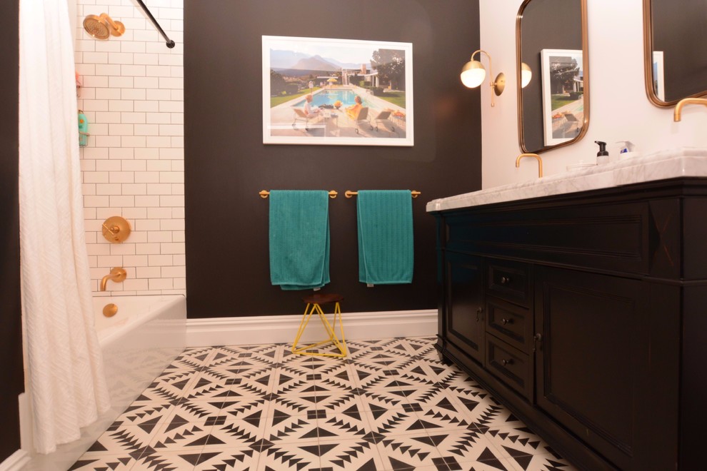 Inspiration for a mid-sized transitional master bathroom in New York with shaker cabinets, brown cabinets, an alcove tub, a shower/bathtub combo, subway tile, white walls, porcelain floors, an undermount sink, marble benchtops and a shower curtain.