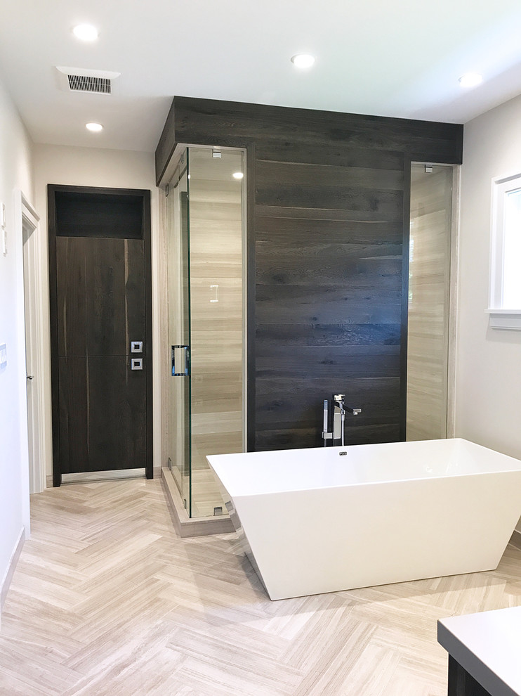 Design ideas for a mid-sized contemporary master bathroom in Chicago with flat-panel cabinets, distressed cabinets, a freestanding tub, a double shower, a wall-mount toilet, gray tile, marble, white walls, marble floors, an undermount sink, engineered quartz benchtops, grey floor and a hinged shower door.