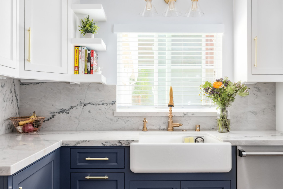 Inspiration for a mid-sized beach style eat-in kitchen in San Francisco with a farmhouse sink, shaker cabinets, blue cabinets, quartzite benchtops, stone slab splashback, stainless steel appliances, light hardwood floors, a peninsula and beige floor.